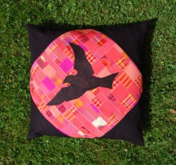 Patchwork med synlig søm og applikation