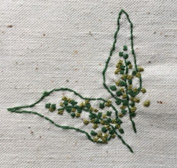 Frit broderi med vilde blomster.